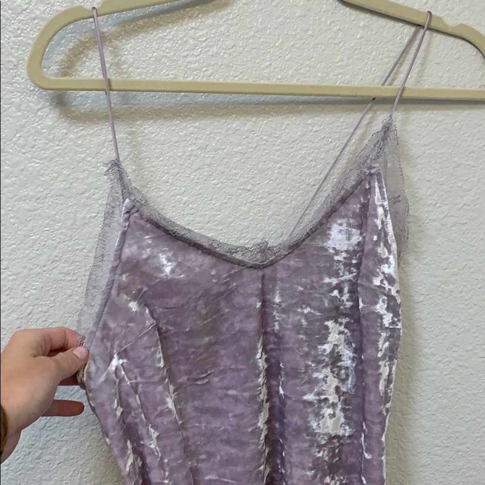 Purple velvet tank going out